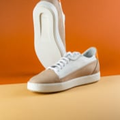 light beige suede sneakers. Front view