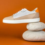 light beige suede sneakers. Side view
